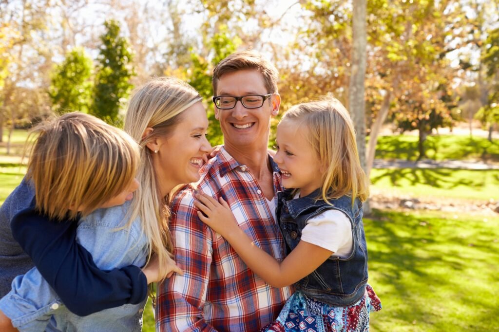 Schedule Urgent Care Appointments in Manvel , TX Young white family having fun together in a park